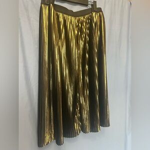 Ava gold and black flashy skirt. Sparkle for this time of year.